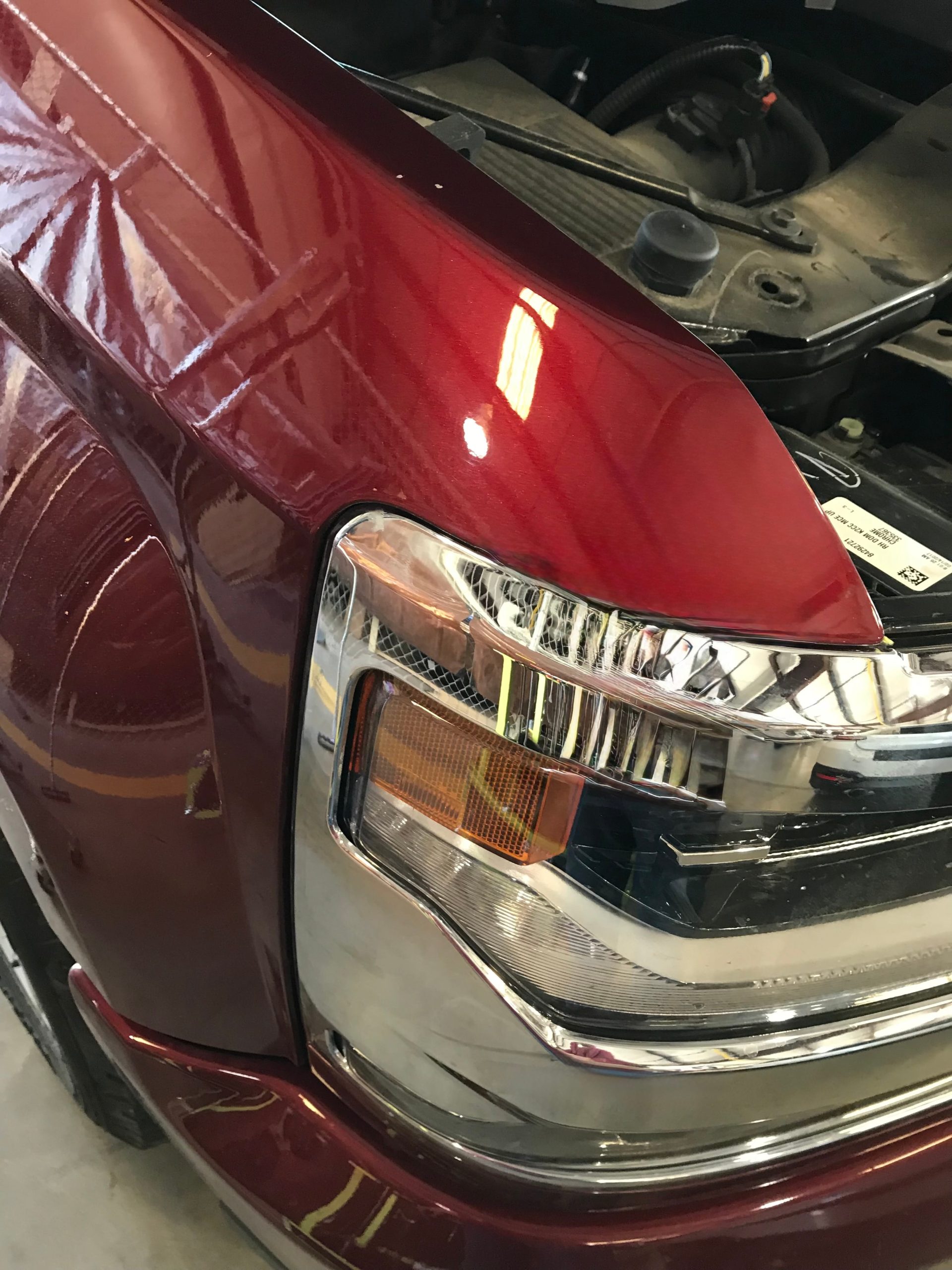 After: Hood dent smoothed and restored without paint or filler